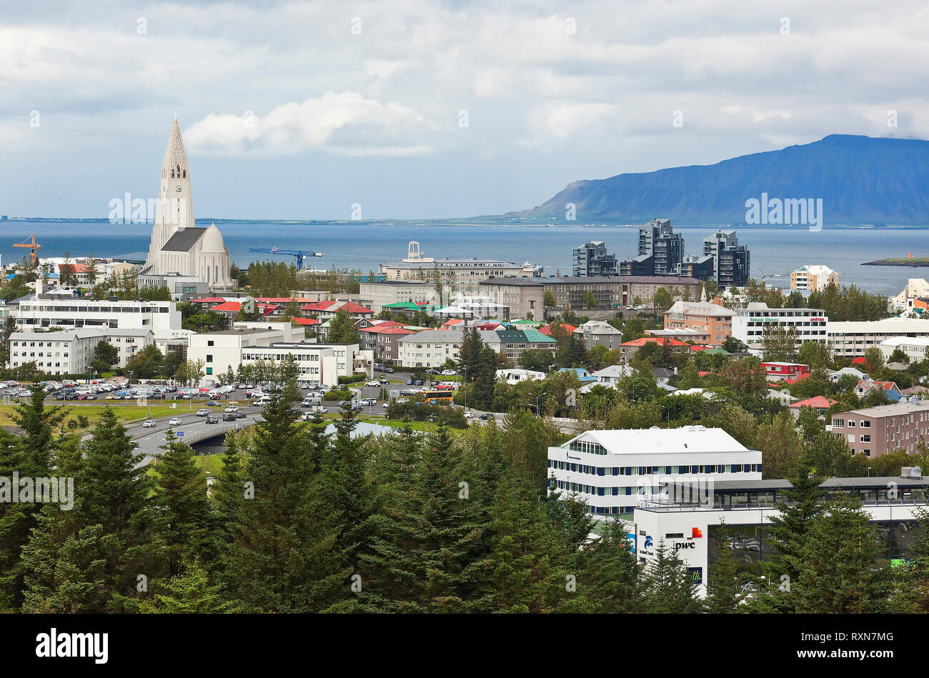 View of the City of Reykjavik from the upper terrace of the Perlan Museum. The church on the left is the Hallgrimskirka Church, one of Reykjavik most famous landmarks, Iceland Stock Photo