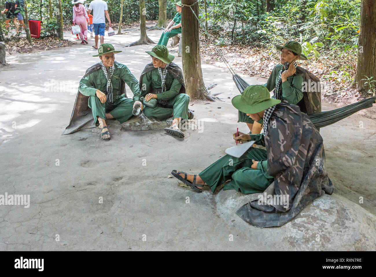 Models of Vietcong fighters at the Cu Chi Tunnels, Vietnam. Stock Photo