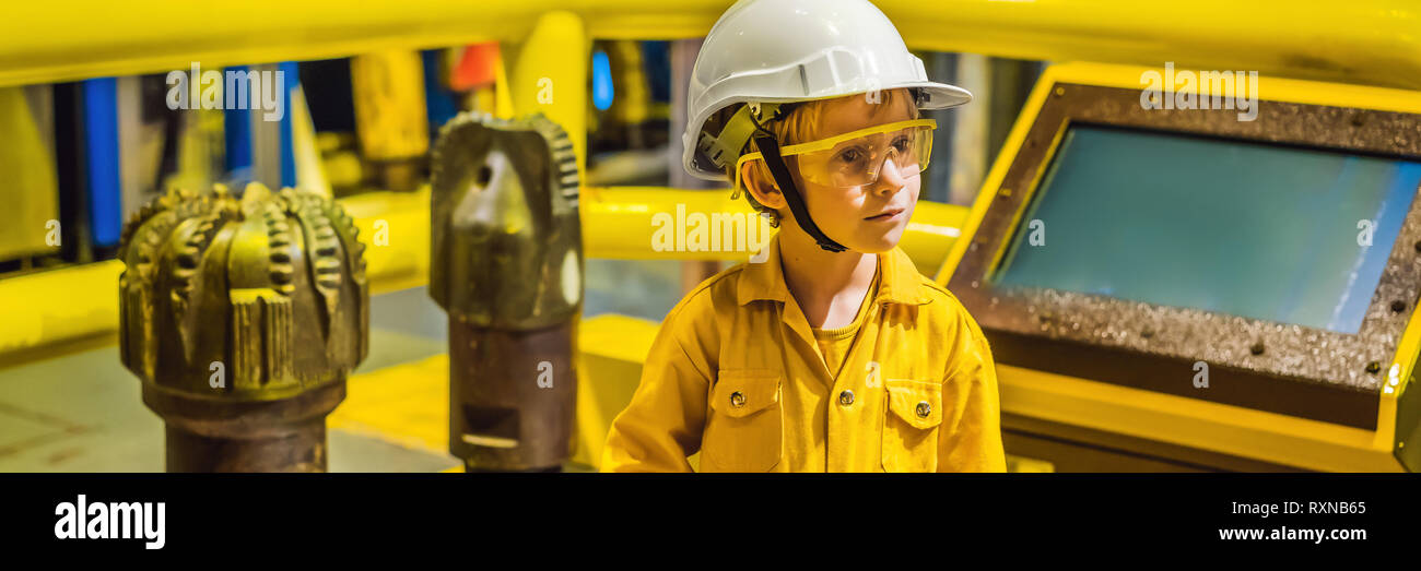 Boy operator recording operation of oil and gas process at oil and rig plant, offshore oil and gas industry, offshore oil and rig in the sea, operator Stock Photo