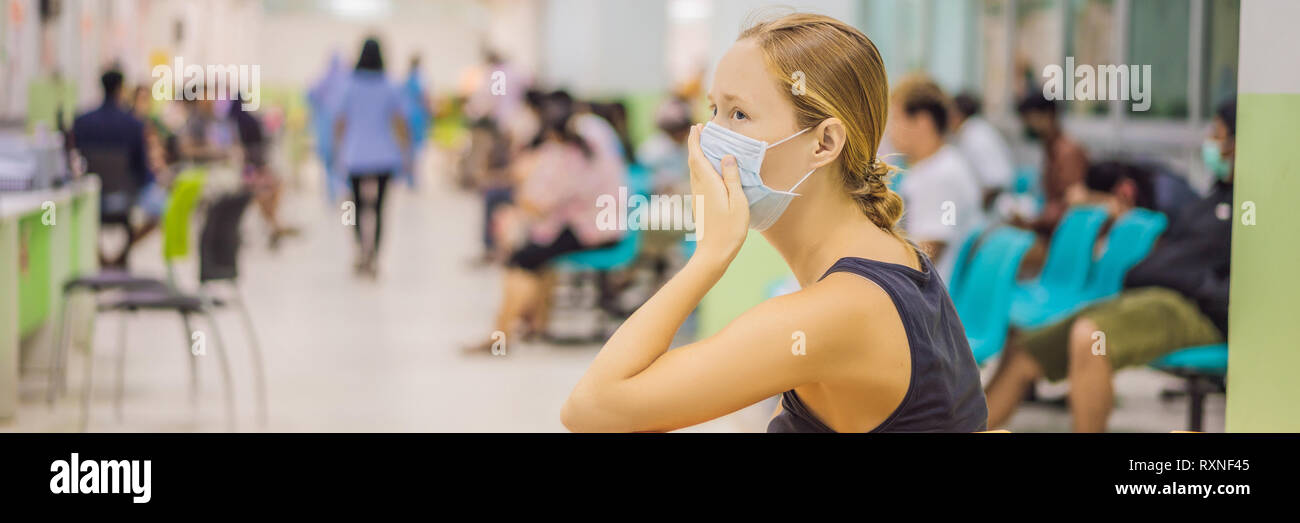 Young Woman Sitting In Hospital Waiting For A Doctor S