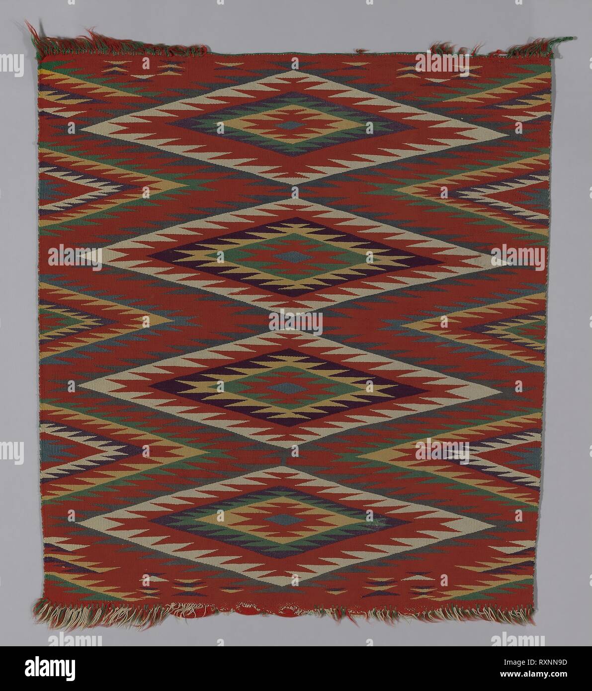 Blanket. Navajo Dine United States New Mexico. Date 1890 1899. Dimensions 88.7 x 77.4 cm 34 7 8 x 30 1 2 in. Cotton and wool single interlocking tapestry weave main warp knotted cut fringe