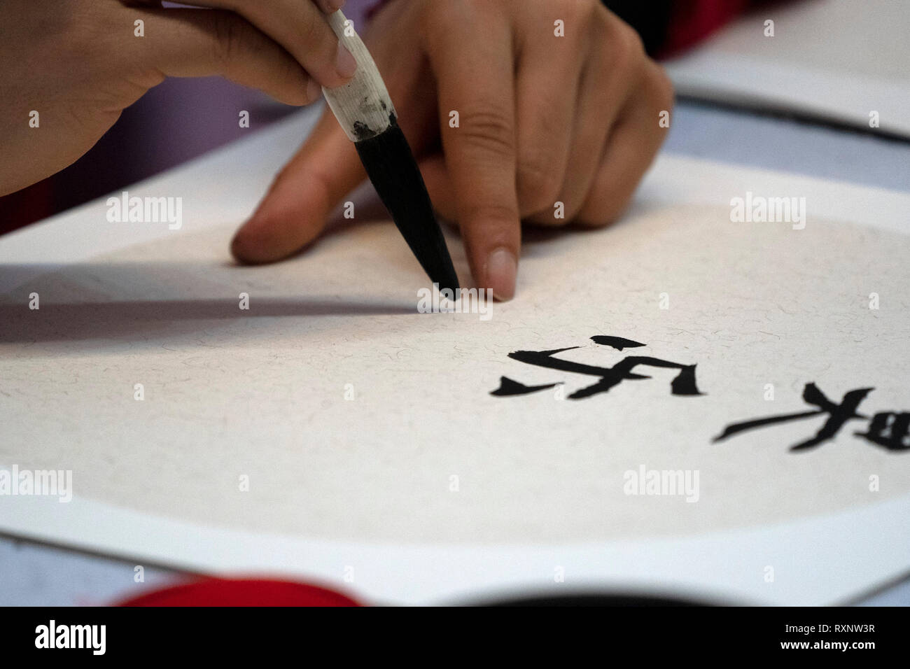 japanese woman writing ideograms with brush close up detail Stock Photo ...