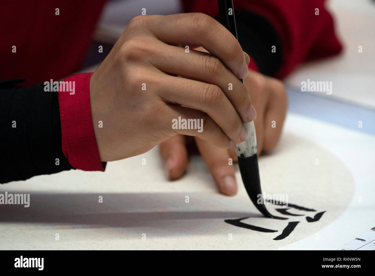 japanese woman writing ideograms with brush close up detail Stock Photo ...