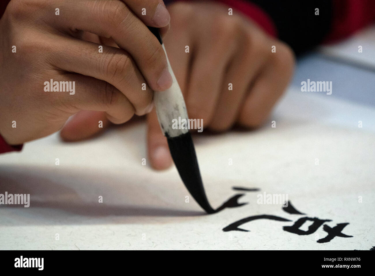 japanese woman writing ideograms with brush close up detail Stock Photo ...