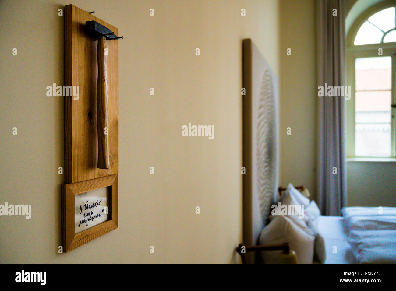The original "nail test" by Günther Uecker hangs on the wall in the room of Hotel Kavaliershaus in Fincken, Germany Stock Photo