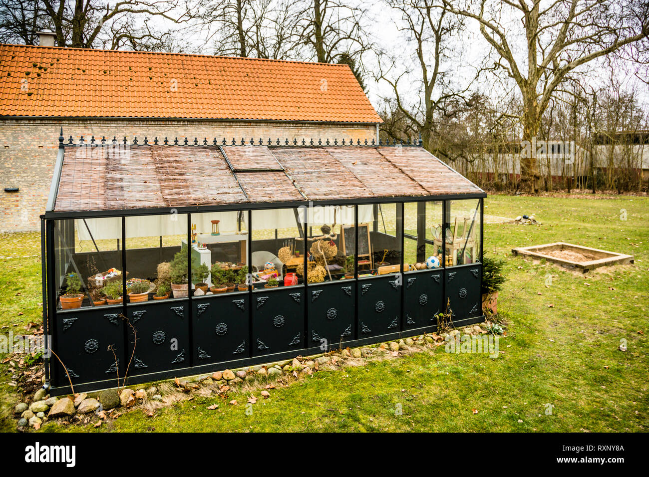 Greenhouse serves as a paradise for children in Hotel Kavaliershaus in Fincken, Germany Stock Photo