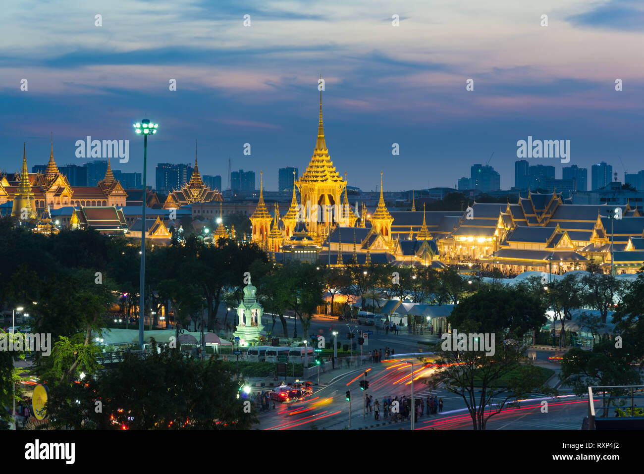 Classic panorama of Bangkok at night - Grand Palace and Sanam luang park golden buddist buildings Stock Photo