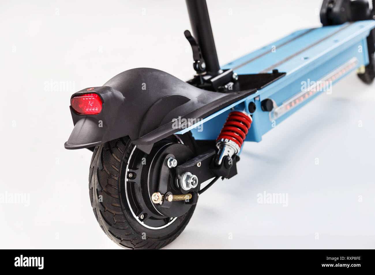 Electric scooter with headlight on white Stock Photo Alamy