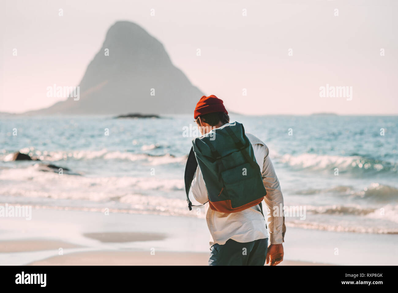 Man Backpacker Walking Alone On Sea Beach Solo Traveling Summer Man Backpacker Walking Alone On Sea Beach Solo Traveling Summer
