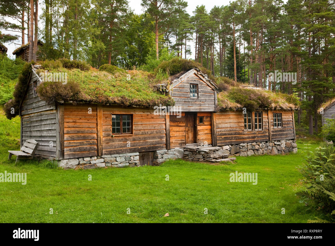 Sod-covered house dating back to the 1830's and identified with a plaque inscribed 'Slettereitstova' at the Sunnmore open-air museum, on the outskirts of Alesund, Norway Stock Photo