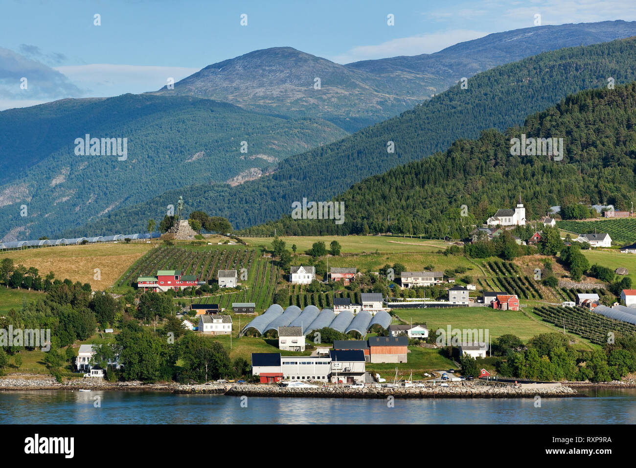 Village of Vangsnes and its many orchards on the banks of the Sognefjord, Norway Stock Photo