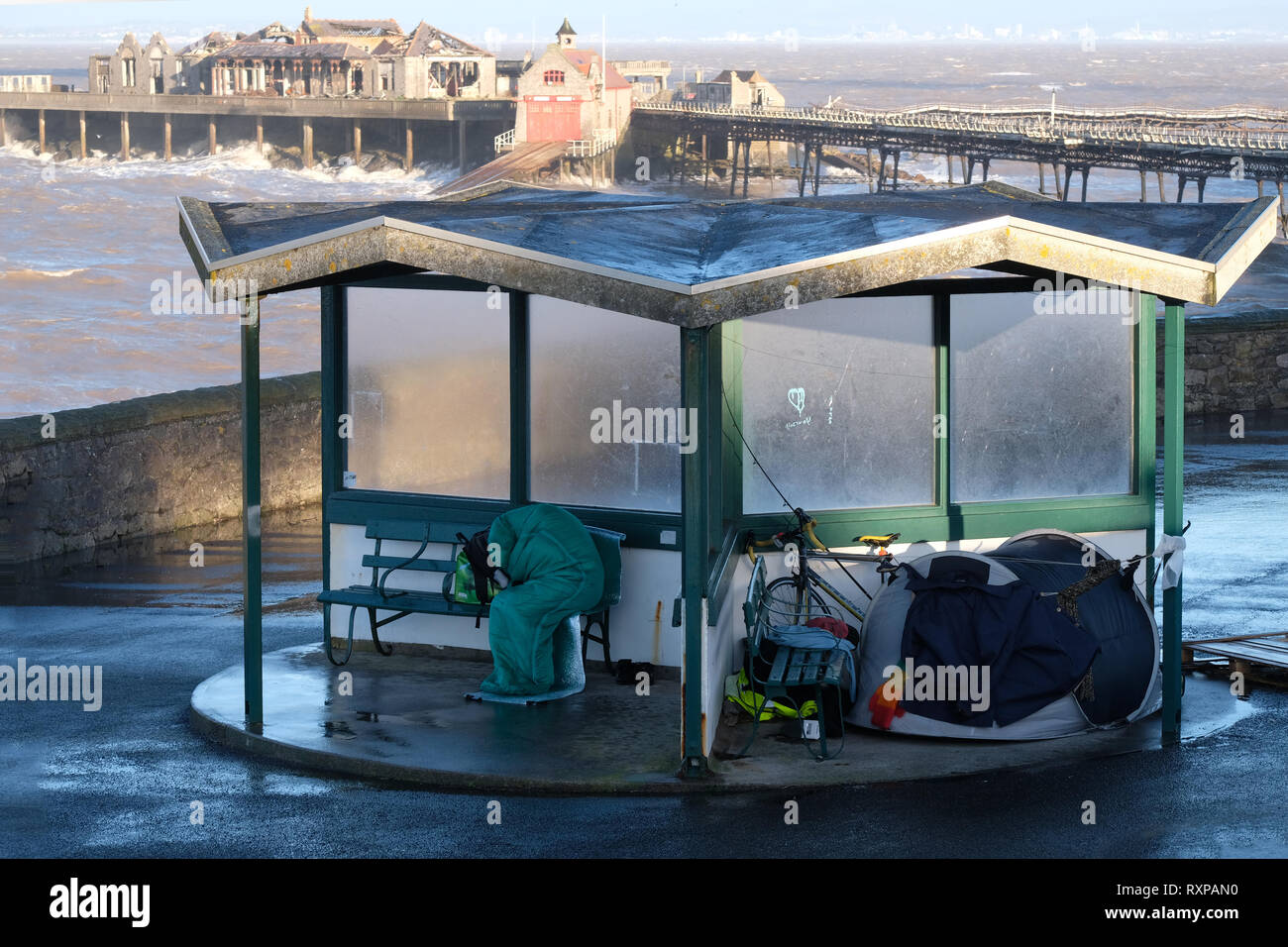 March 2019 - Street folk sleeping rough in front of the old Birnbeck Pier north of Weston super Mare,Somerset,England, UK Stock Photo