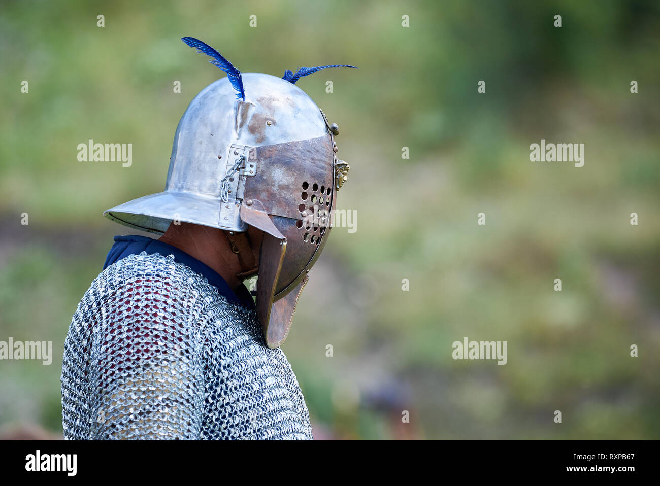 Gladiator with helmet and body armor Stock Photo