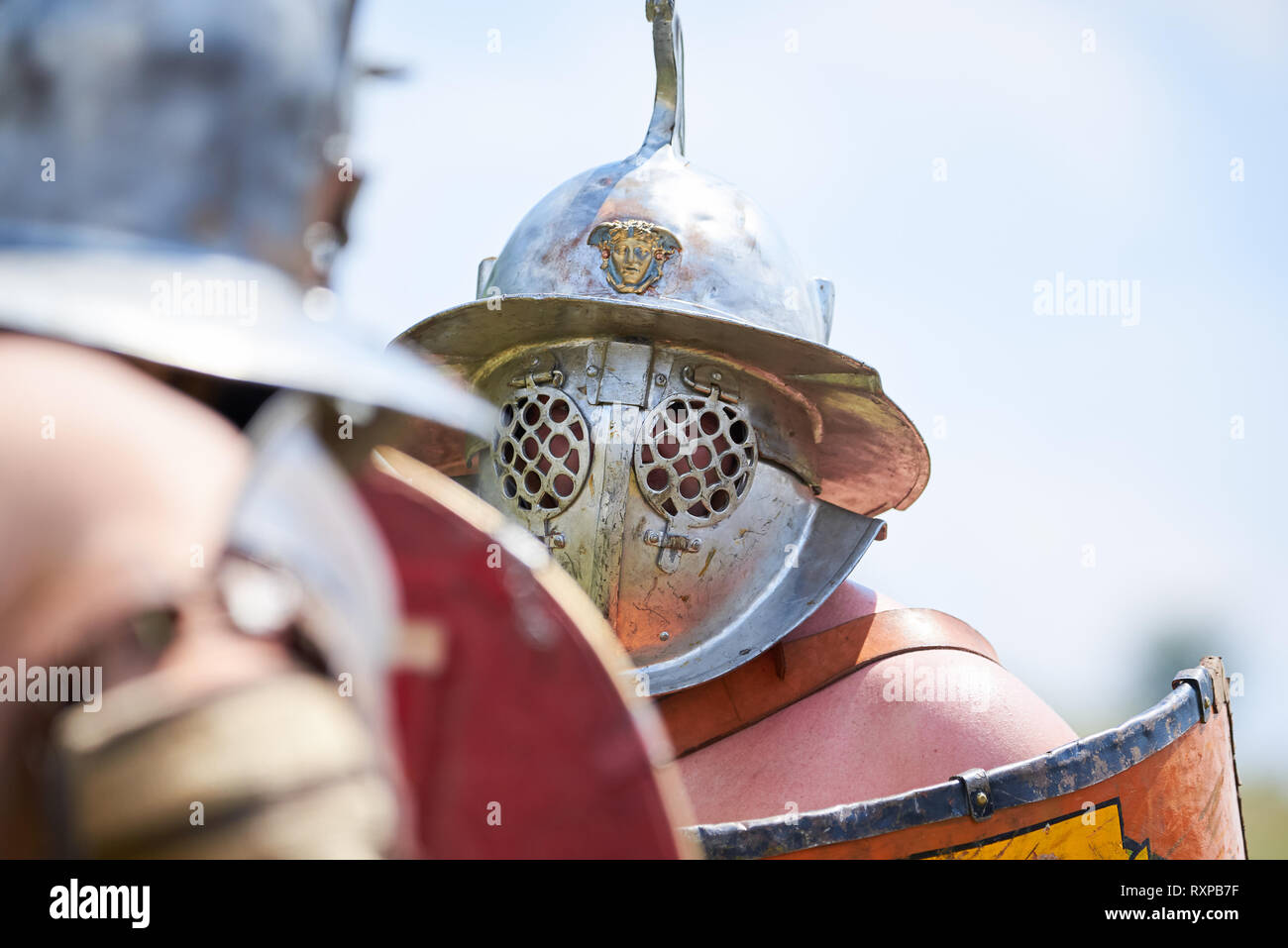 Gladiator with helmet and body armor Stock Photo - Alamy