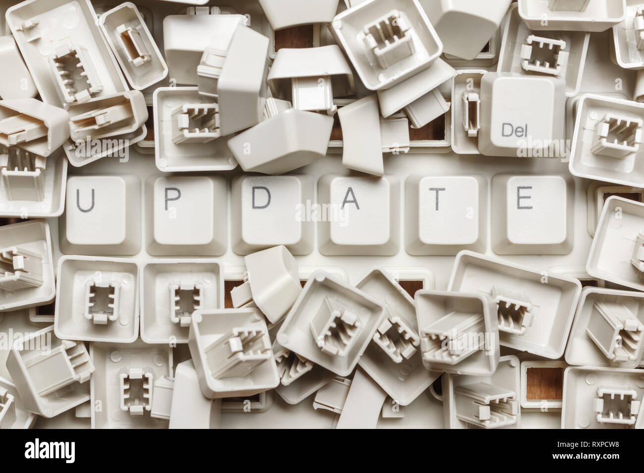 Word update from a heap of computer keys Stock Photo