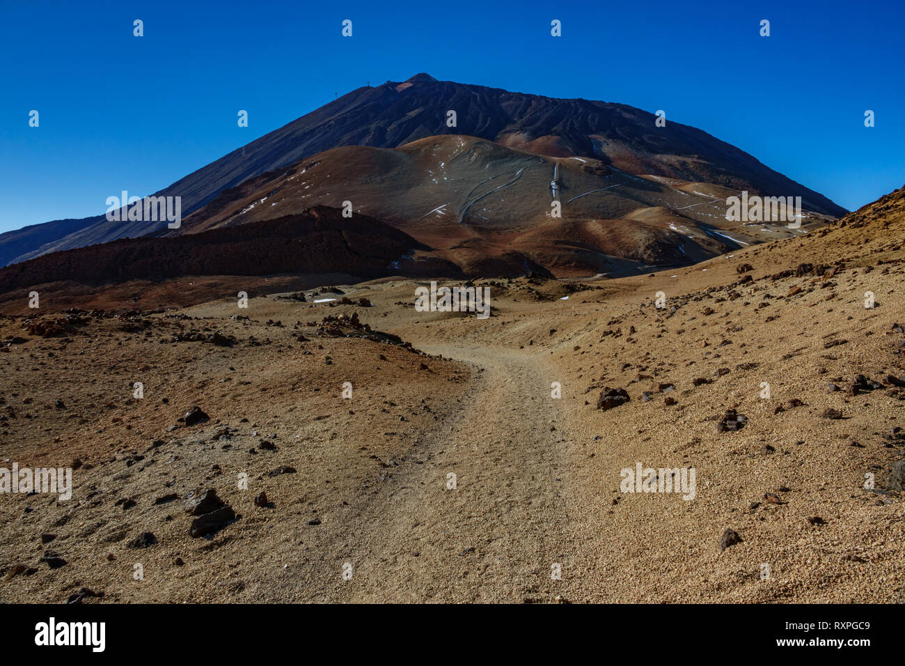Mars landscape with tracks towards Teide volcano peak Stock Photo