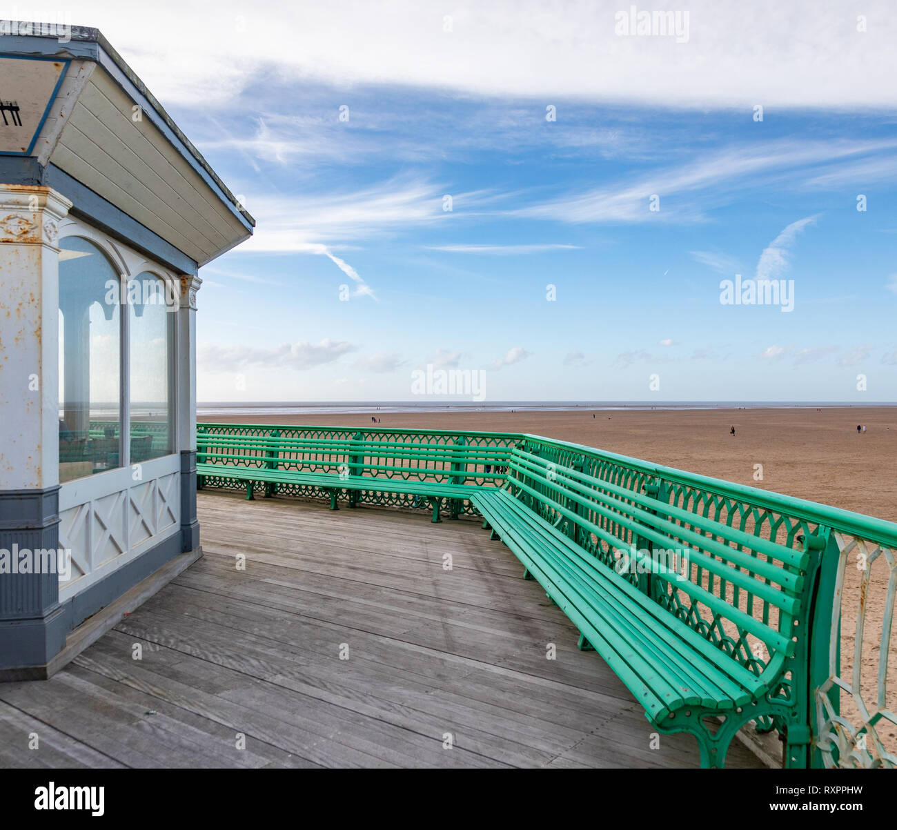 A bench, footpath and building on St Annes on Sea Pier Stock Photo