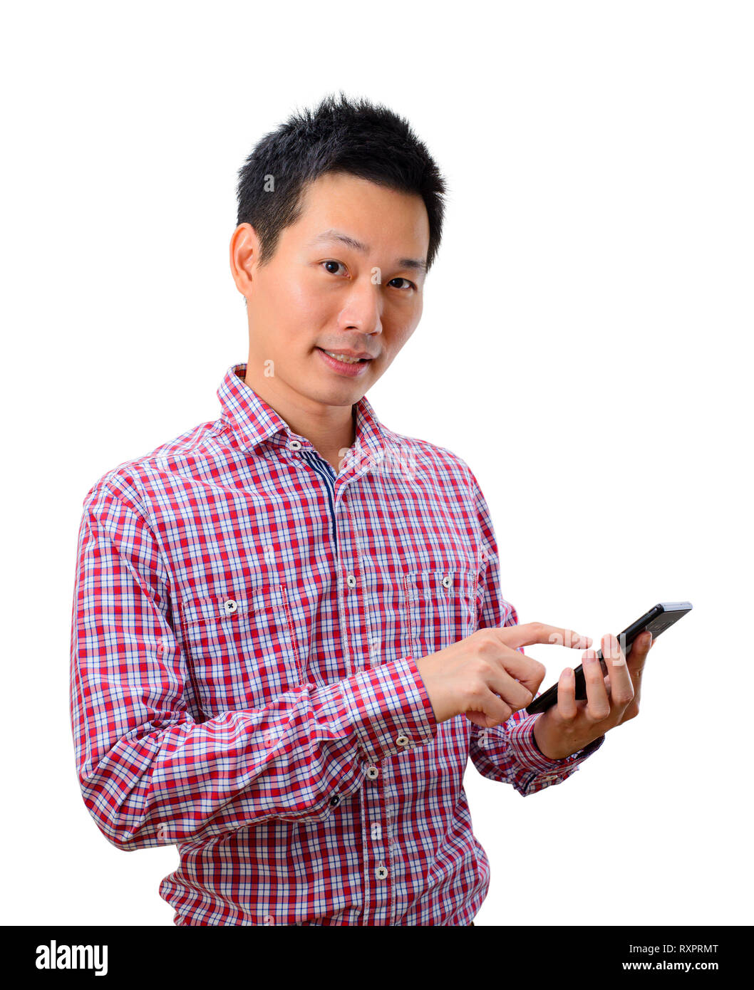 Young asian man using smartphone on white background Stock Photo
