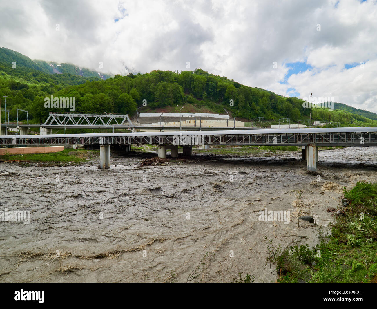 The powerful flow of a mountain river in the spring. Spring flood Stock ...