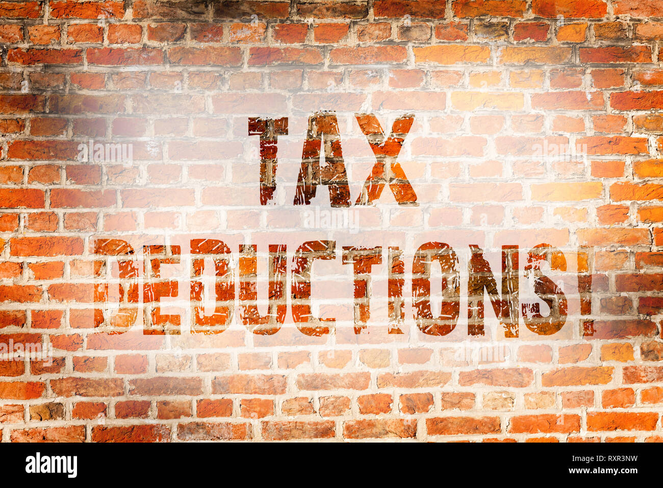 Conceptual Hand Writing Showing Tax Deductions Concept Meaning Reduction On Taxes Investment Savings Money Returns Brick Wall Art Like Graffiti Motiv Stock Photo Alamy