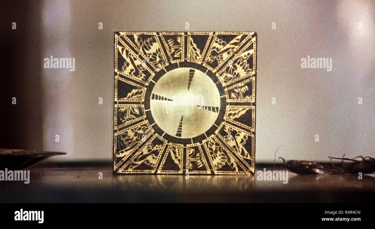 Hellraiser (1987) directed by Clive Barker and starring Andrew Robinson, Clare Higgins, Ashley Laurence. The Lament Configuration puzzle box. Stock Photo
