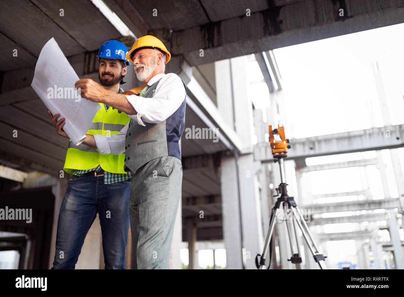 Group of construction engineer working in construction site Stock Photo ...