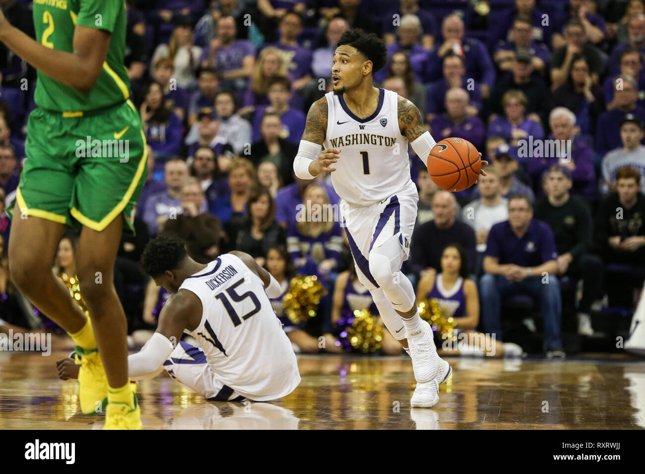 Seattle, WA, USA. 9th Mar, 2019. Washington Huskies guard David Crisp (1) brings the ball up the court during a college men's basketball game between the Oregon Ducks and the Washington Huskies at Alaska Airlines Arena in Seattle, WA. The Ducks defeated the Huskies 55-46. Sean Brown/CSM/Alamy Live News Stock Photo