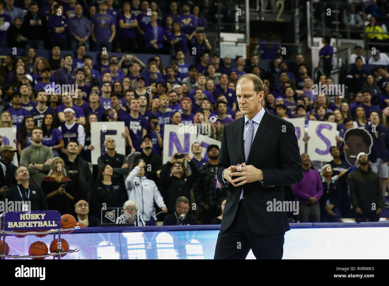 Seattle, WA, USA. 9th Mar, 2019. Washington Huskies head coach Mike Hopkins stands at halfcourt before senior night player introductions before a college men's basketball game between the Oregon Ducks and the Washington Huskies at Alaska Airlines Arena in Seattle, WA. The Ducks defeated the Huskies 55-46. Sean Brown/CSM/Alamy Live News Stock Photo