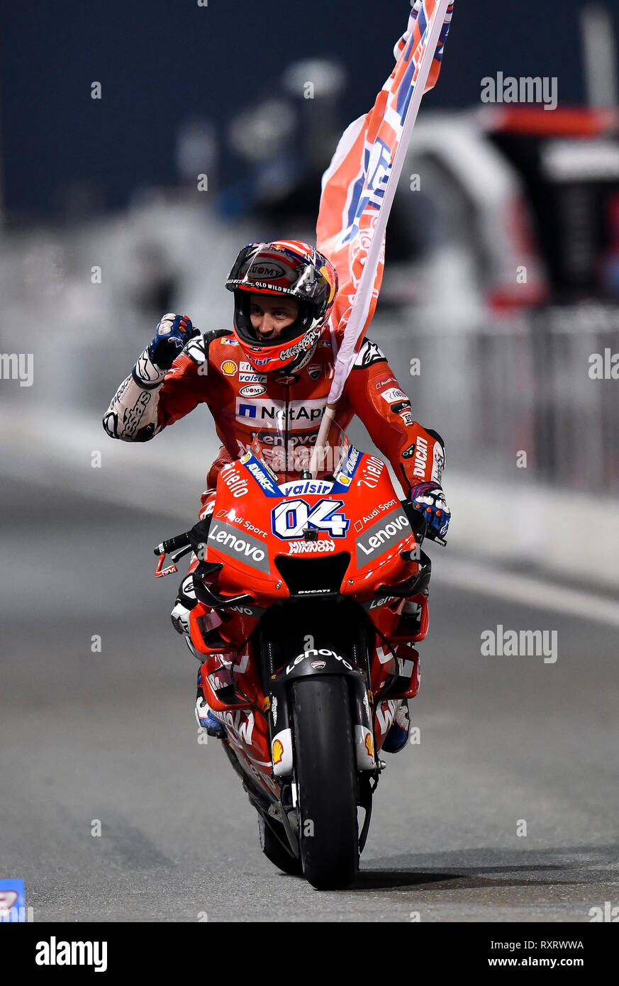 Doha, Qatar. 10th Mar, 2019. Ducati Team's Italian rider Andrea Dovizioso  celebrates after winning the MotoGP race of the 2019 MotoGP Grand Prix of  Qatar in Losail Circuit of Doha, capital of