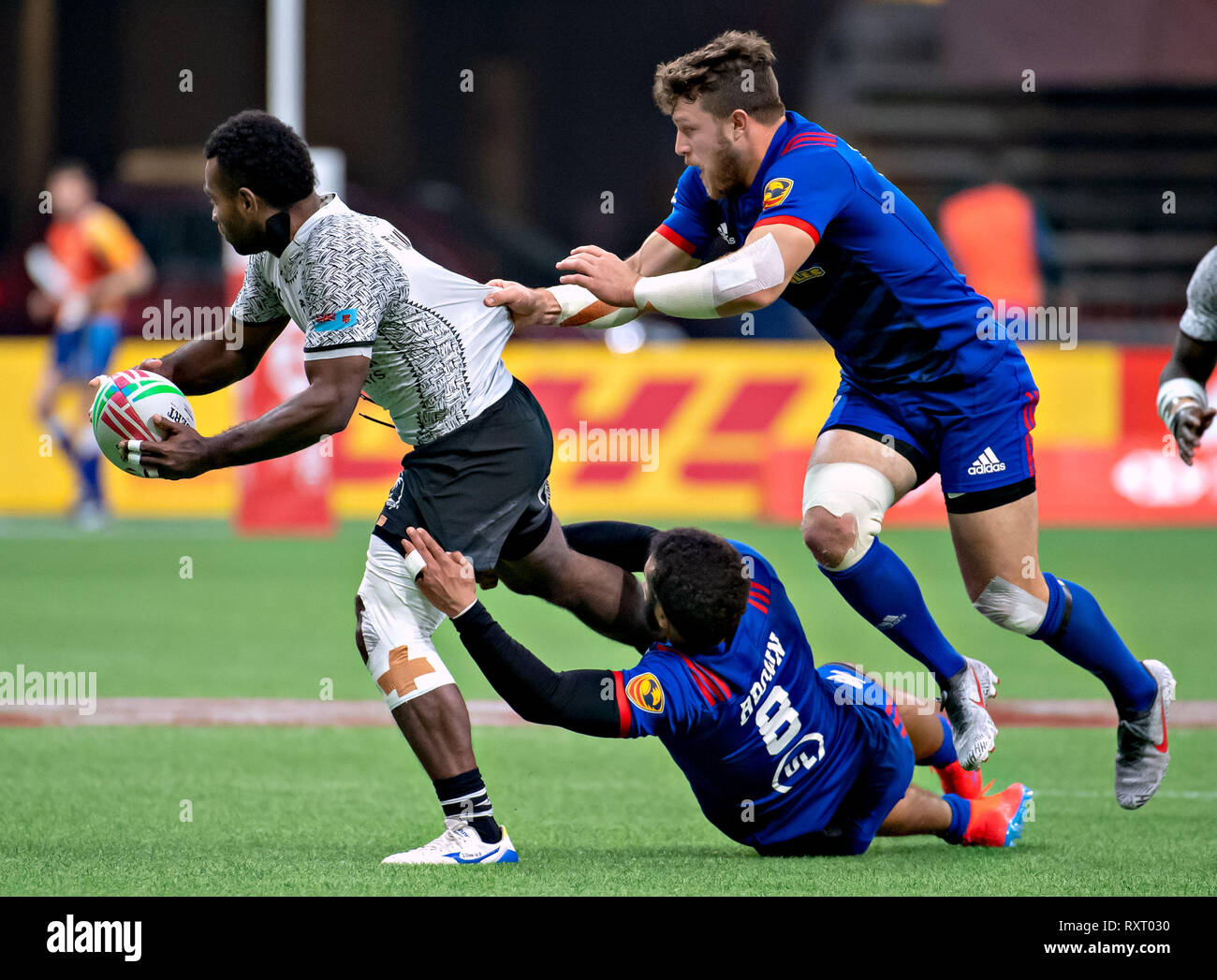 Vancouver, Canada. 10th Mar, 2019. Jerry Tuwai (L) of Fiji competes