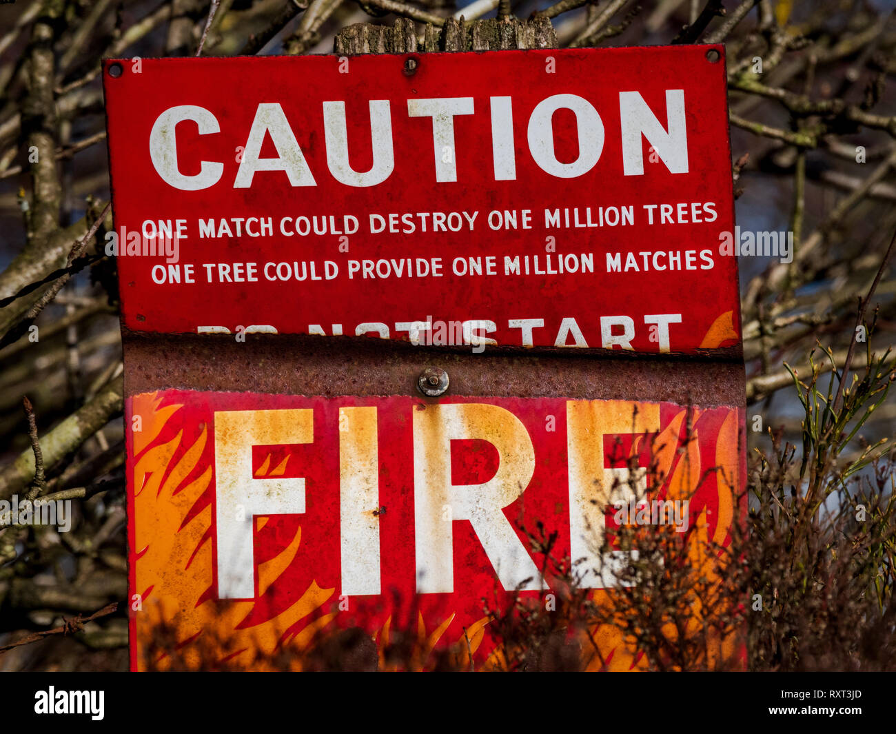 Caution FIRE sign warning Stock Photo