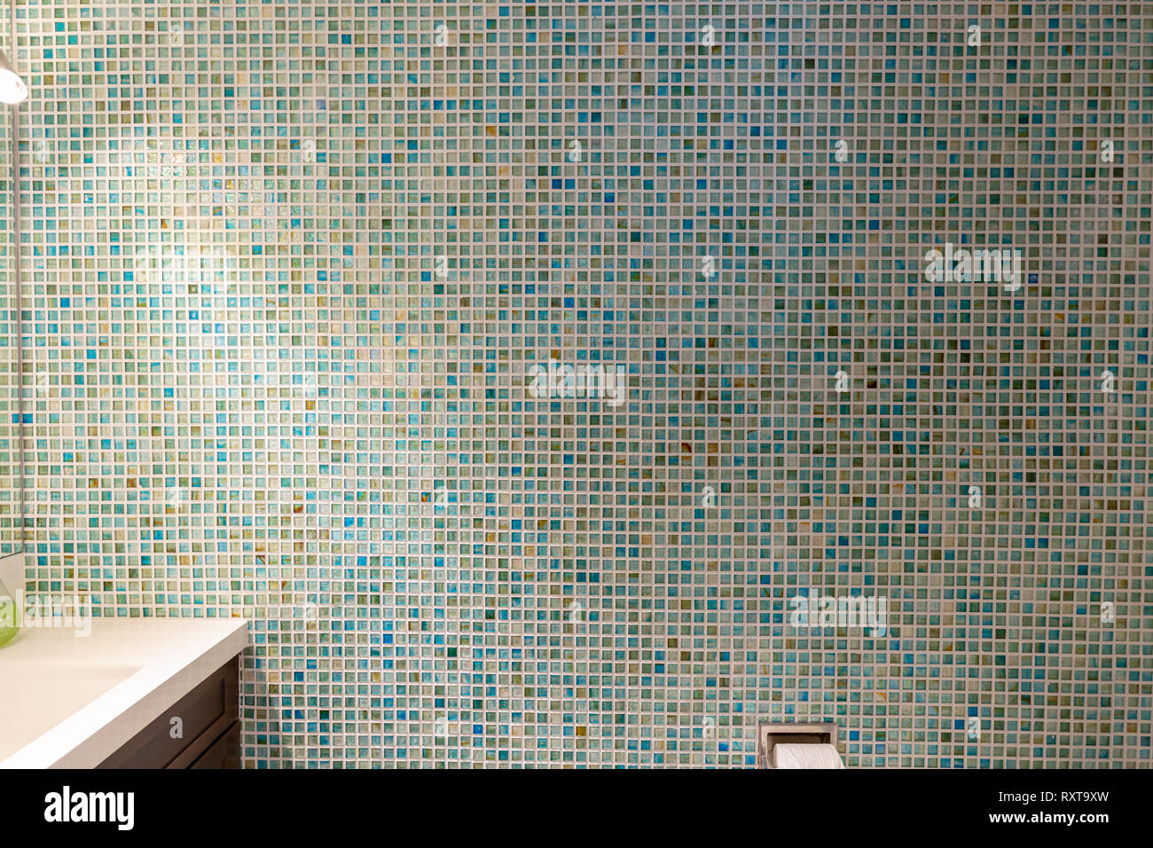 Glass tiled bathroom wall Stock Photo - Alamy