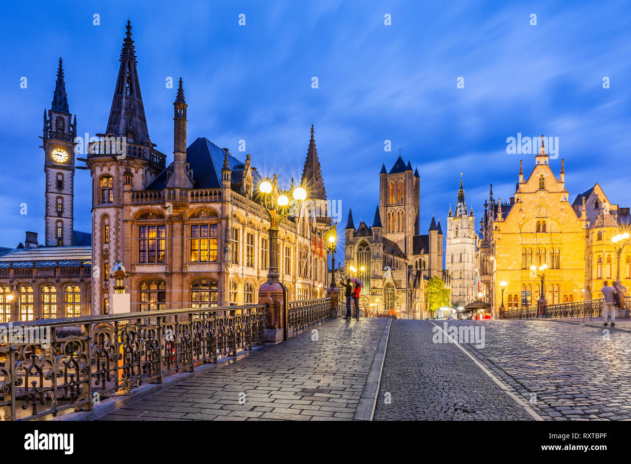 Ghent, Belgium. The Sint-Michielsbrug bridge, medieval mansions, St Nicholas Church and Belfort van Gent (Belfry) Stock Photo