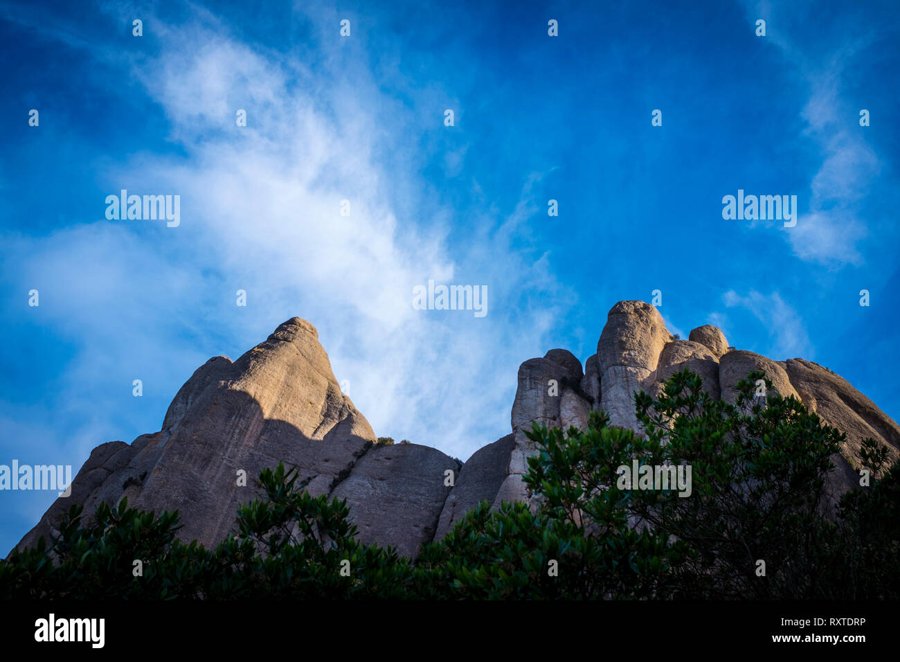 The saw-toothed mountain of Montserrat, near Barcelona, Catalonia, the first national park established in Spain. Stock Photo