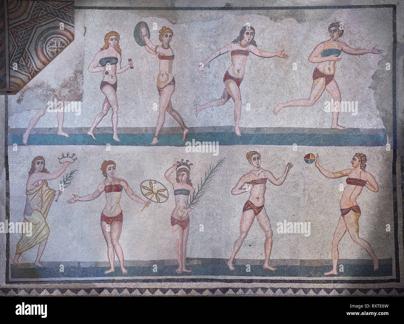 Wide picture of the Roman mosaics of the room of the Ten Bikini Girls depicting Roman women in an athletic competition, room no 30, at the Villa Roman Stock Photo