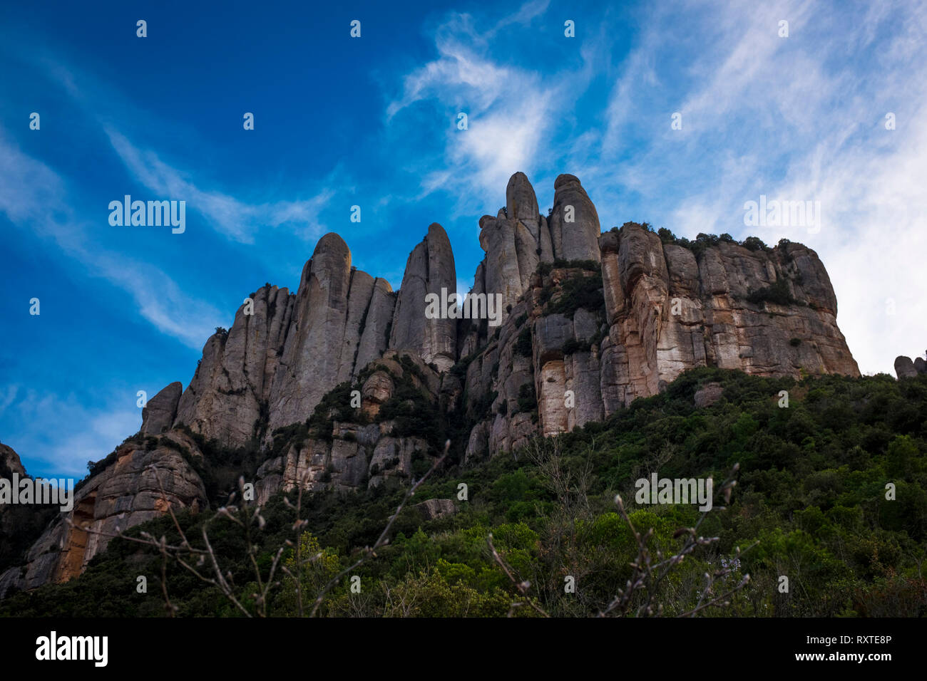 The saw-toothed mountain of Montserrat, near Barcelona, Catalonia, the first national park established in Spain. Stock Photo