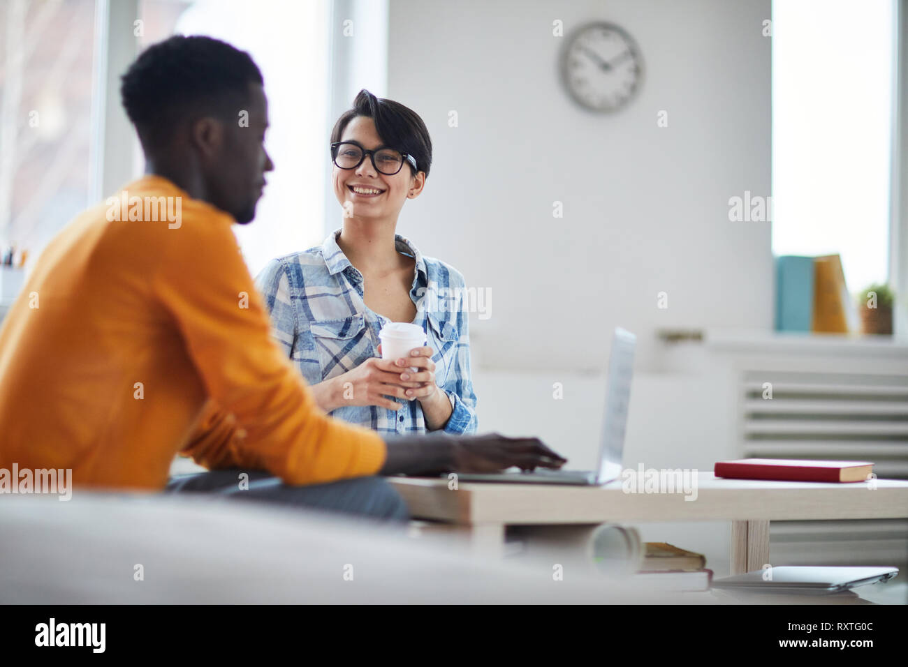 Talking at coffee break Stock Photo