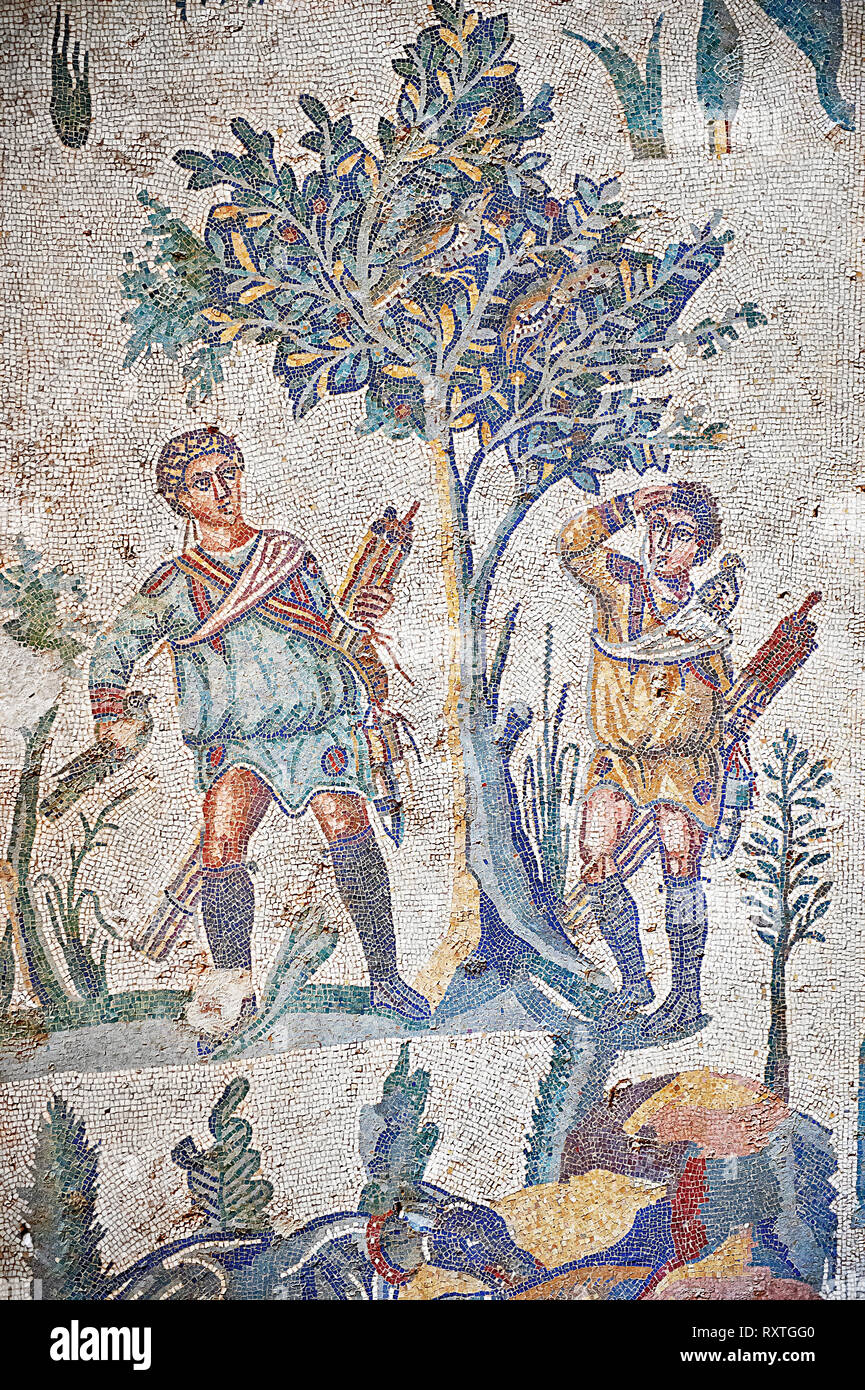 Hunters looking for birds. Roman mosaic floor of the Room of The Small Hunt, no 25 - Roman mosaics at the Villa Romana del Casale ,  circa the first q Stock Photo