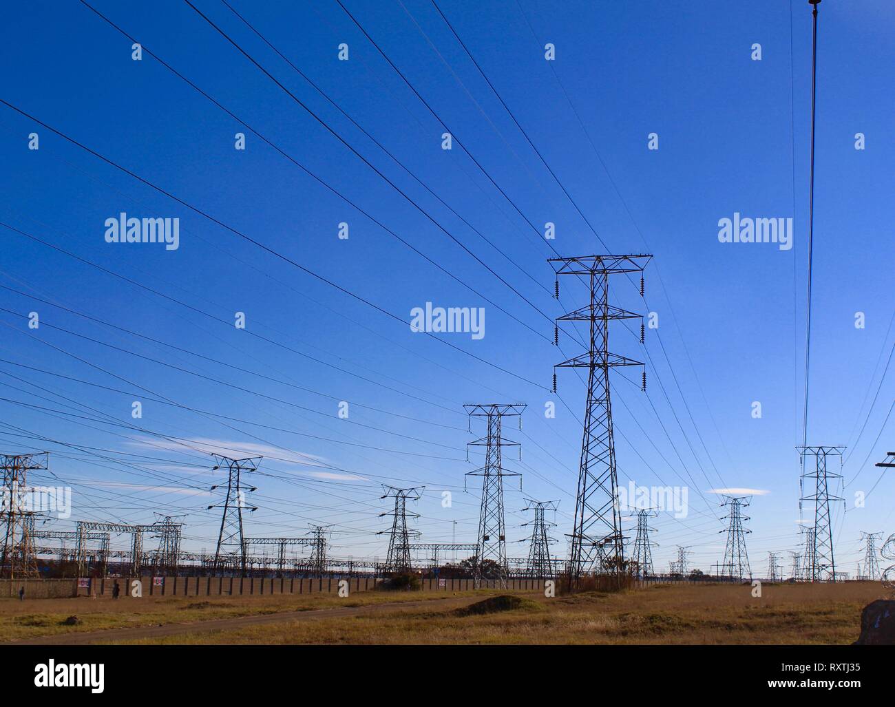 Electricity pylons in Soweto, Johannesburg, South Africa Stock Photo