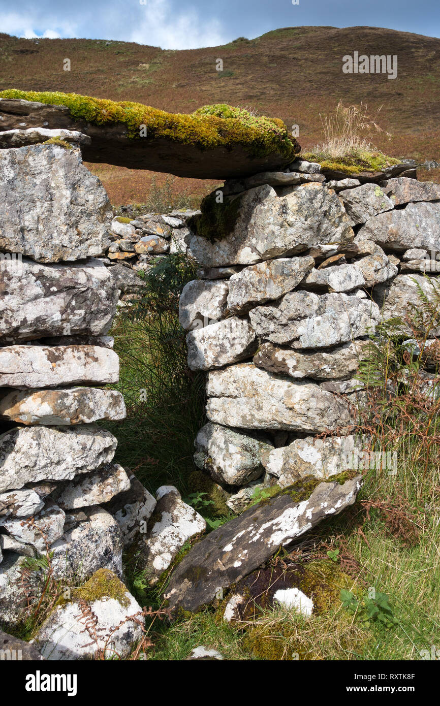 Doorway in ruins of old stone croft building, Boreraig, Isle of Skye, Scotland, UK Stock Photo