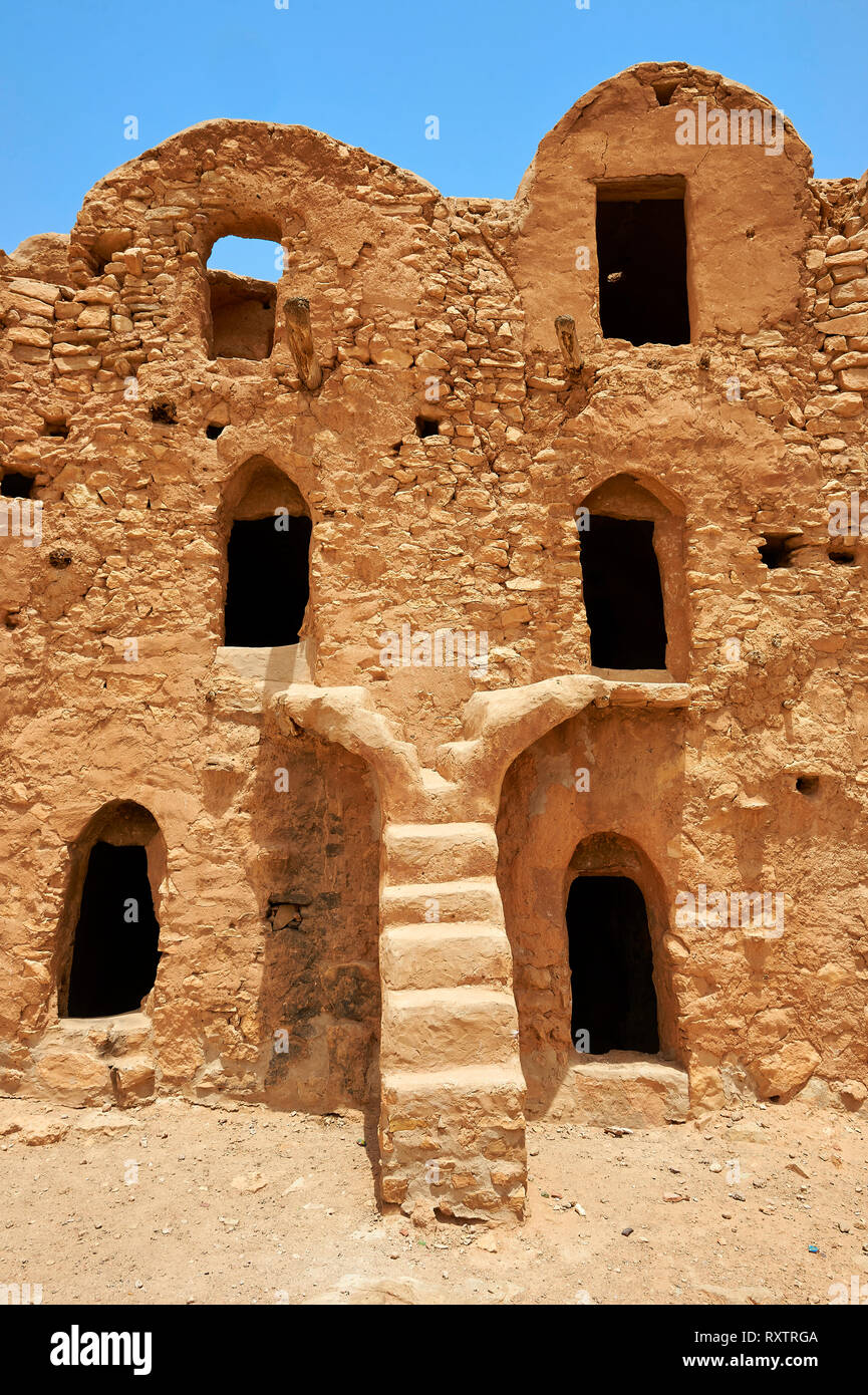 The traditional north Sahara fortified Berber Ksar El Mguebl and its adobe mud ghorfas graneries, near Tataouine, Tunisia Stock Photo