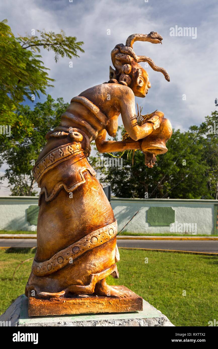 Ixchel or Ix Chel Statue of Jaguar Goddess Vertical Portrait in Ancient Maya Culture in public park on Cozumel Mexico Waterfront Stock Photo