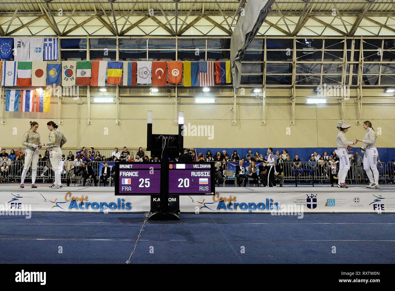 Athletes of Women's fencing teams of France and Russia are seen in action during the teams final of International fencing tournament, Acropolis Coupe 2019. Stock Photo