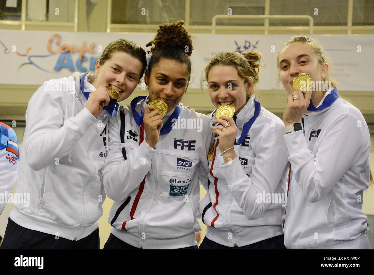 Athletes of Women's fencing team of  France are seen celebrating after winning at the teams final of International fencing tournament Acropolis Coupe 2019. Stock Photo