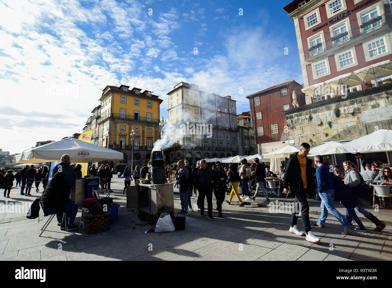 Tourists and locals seen walking with in the historical neighbourhood Ribeira. In 2018, Porto entered the list of the 100 most visited cities in the world in a ranking prepared by Euromonitor International. In 2018 it is estimated that the number of tourists reached 2.39 million. Stock Photo
