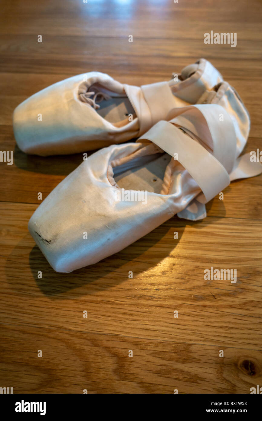 Classical Ballet pointe shoes, Ballerinas Pointe Shoes on a wooden floor  Stock Photo - Alamy