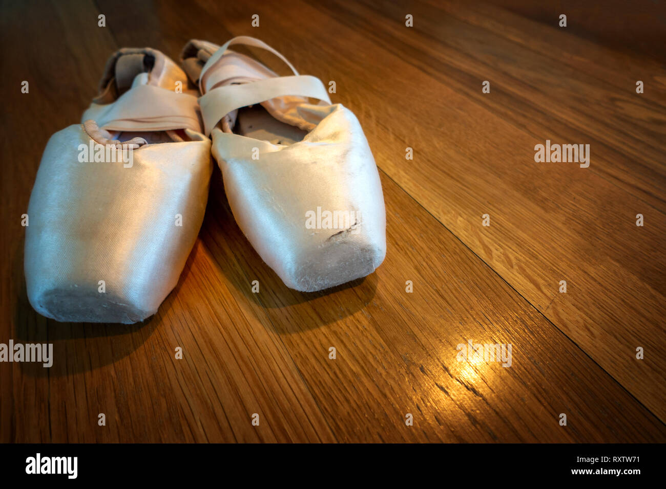 Classical Ballet pointe shoes, Ballerinas Pointe Shoes on a wooden