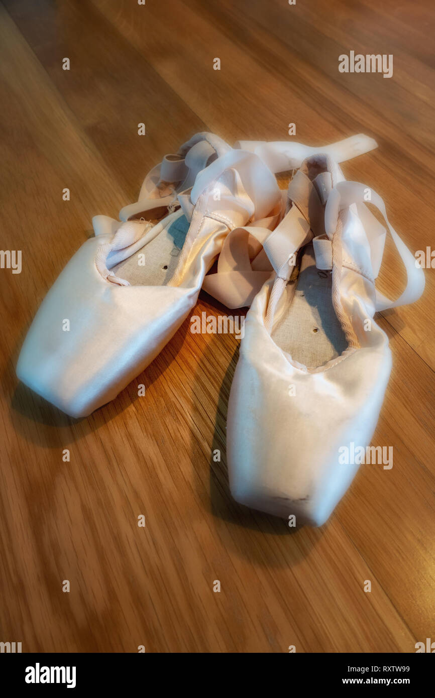 Classical Ballet pointe shoes, Ballerinas and Pointe Shoes on a wooden ...