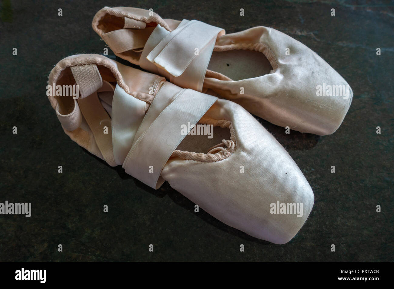 Classical Ballet pointe shoes, Ballerinas and Pointe Shoes on a marble