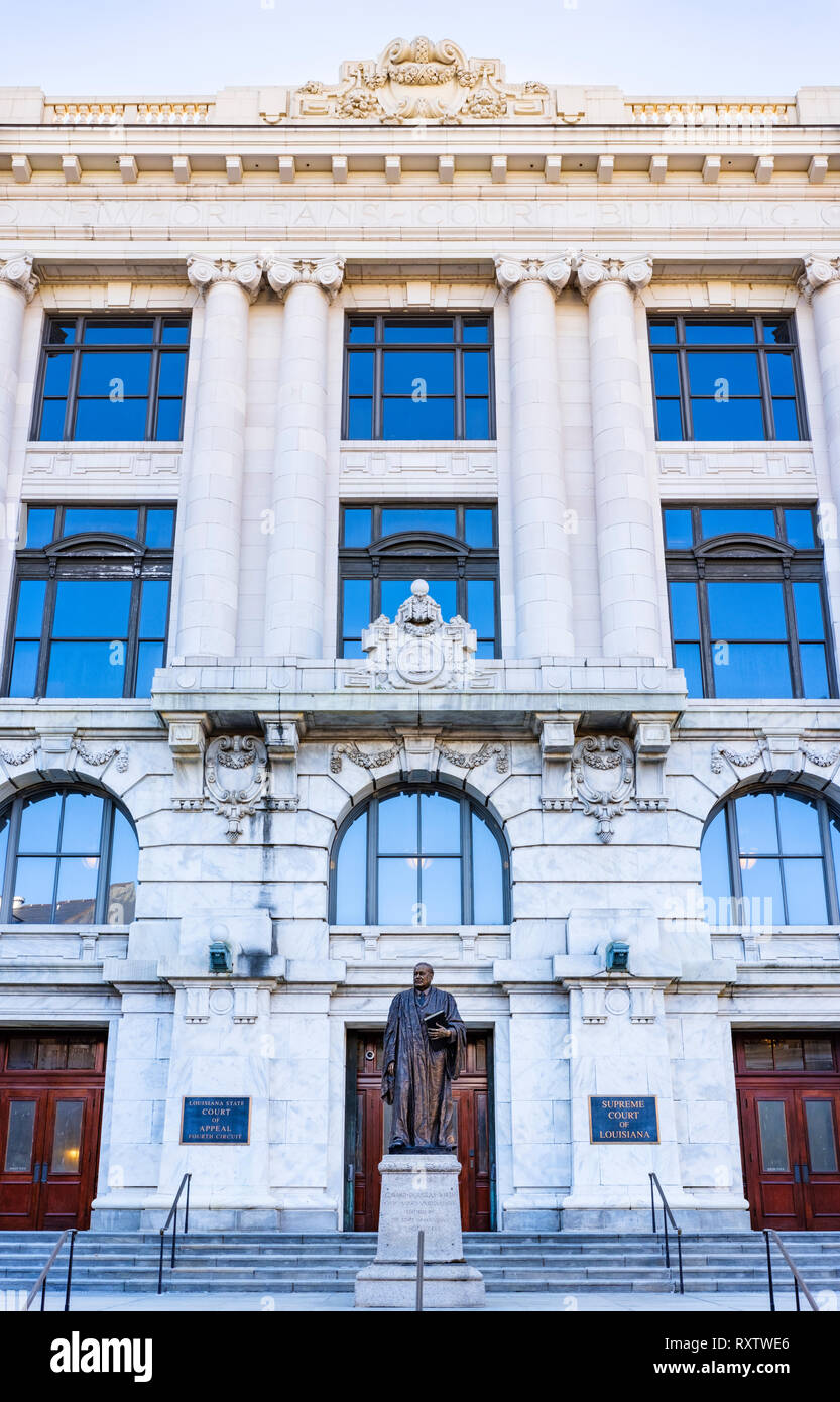 Panoramic image of Louisiana Supreme Court building with statue of